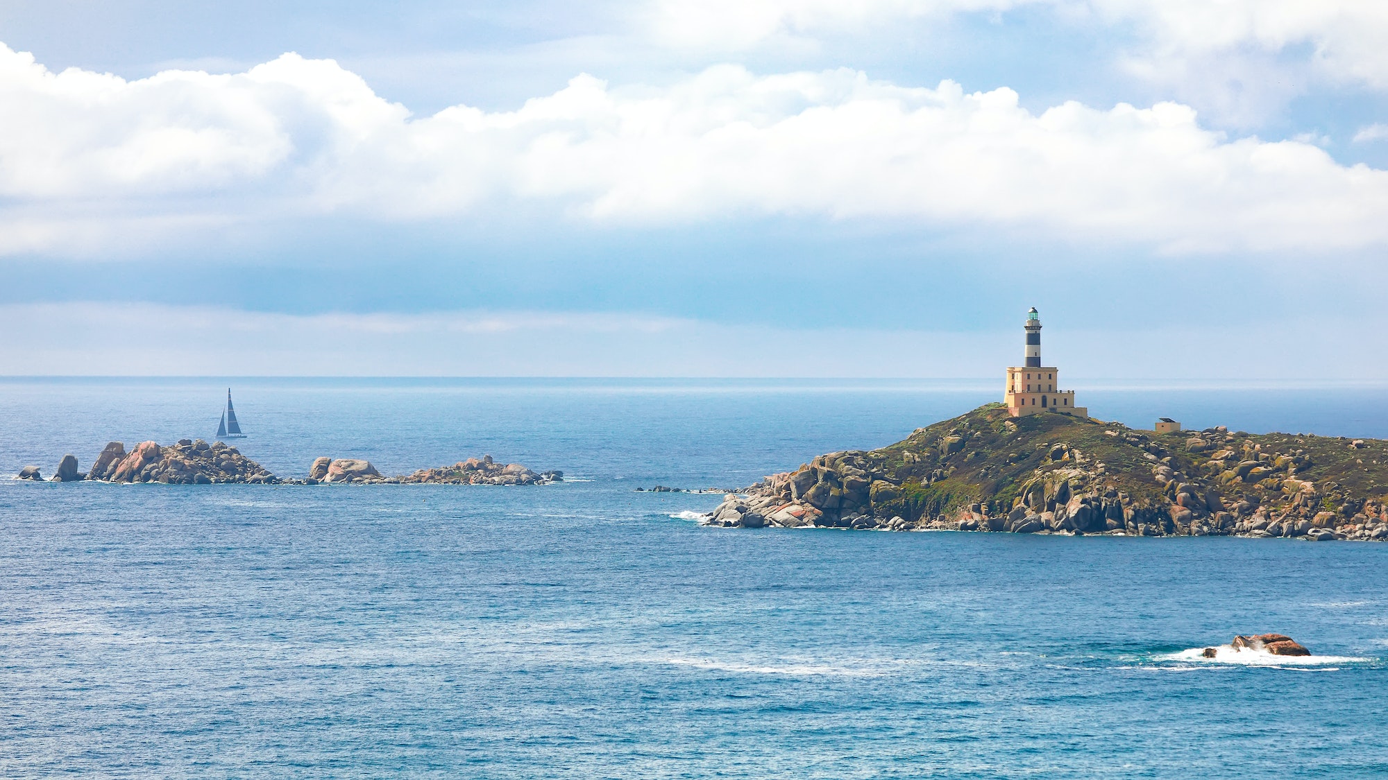 Fantastic view of Capo Carbonara lighthouse with turquoise water.